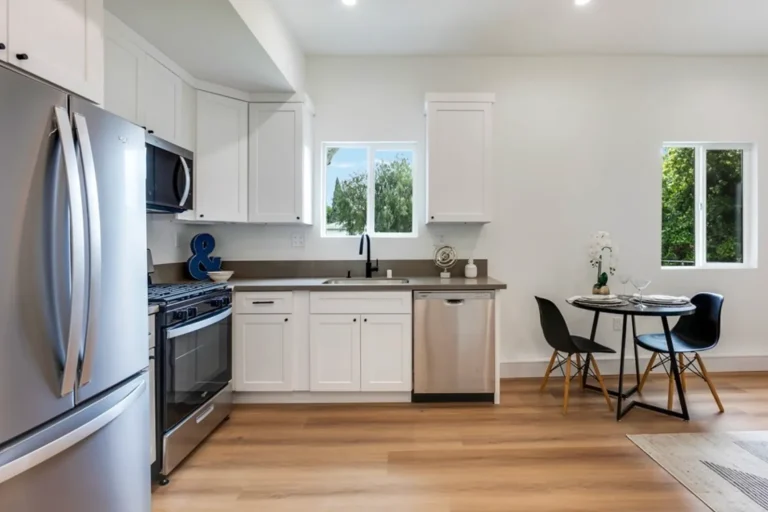 Staged kitchen with white cabinets